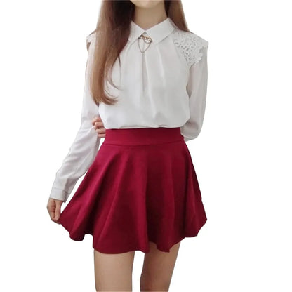 Jupe femme style été 2026 jupe de couleur unie sexy taille haute midi plissée jupes à rayures noires style école coréen mini trapèze jupe