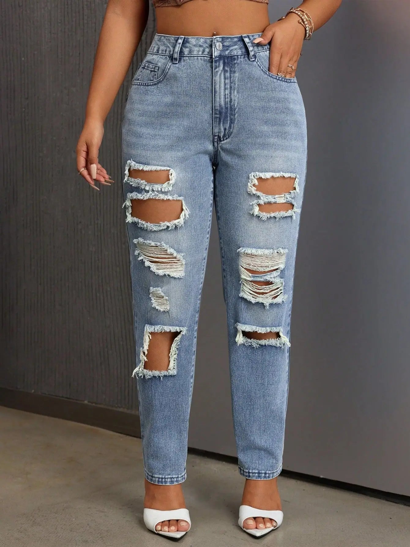 Mode européenne et américaine, jeans délavés et déchirés polyvalents et décontractés, nouveaux pantalons femme printemps-été à jambes étroites. Jeans 9 pouces