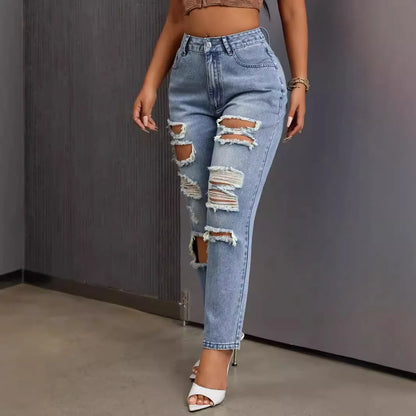 Mode européenne et américaine, jeans délavés et déchirés polyvalents et décontractés, nouveaux pantalons femme printemps-été à jambes étroites. Jeans 9 pouces