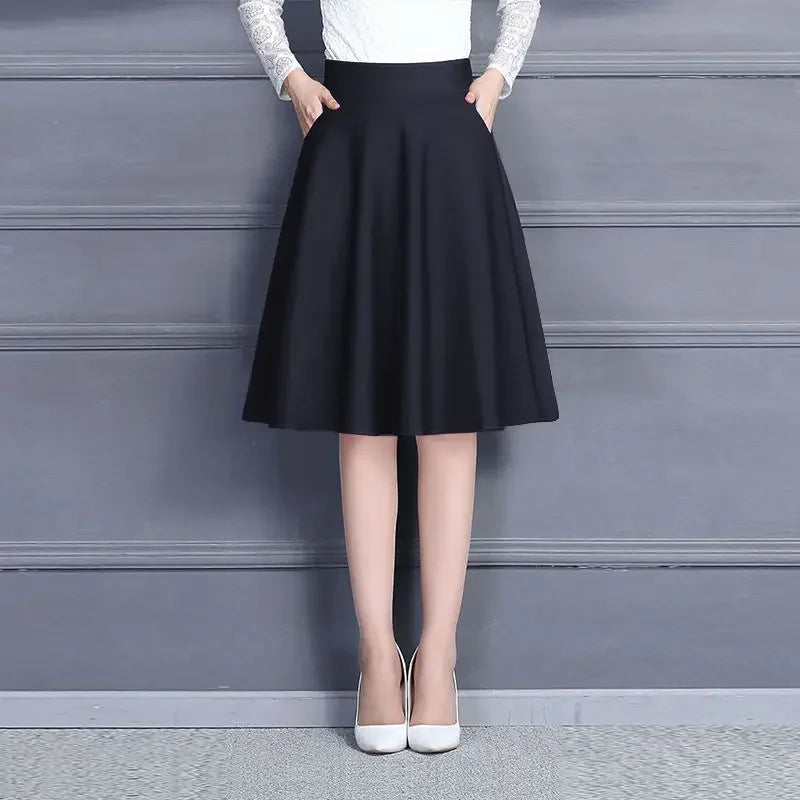 Jupes pour femmes populaires M-3XL jupe mi-longue plissée unie avec poches, taille élastique, tendance, facile à assortir, style femme de bureau, douce pour la peau, élégante