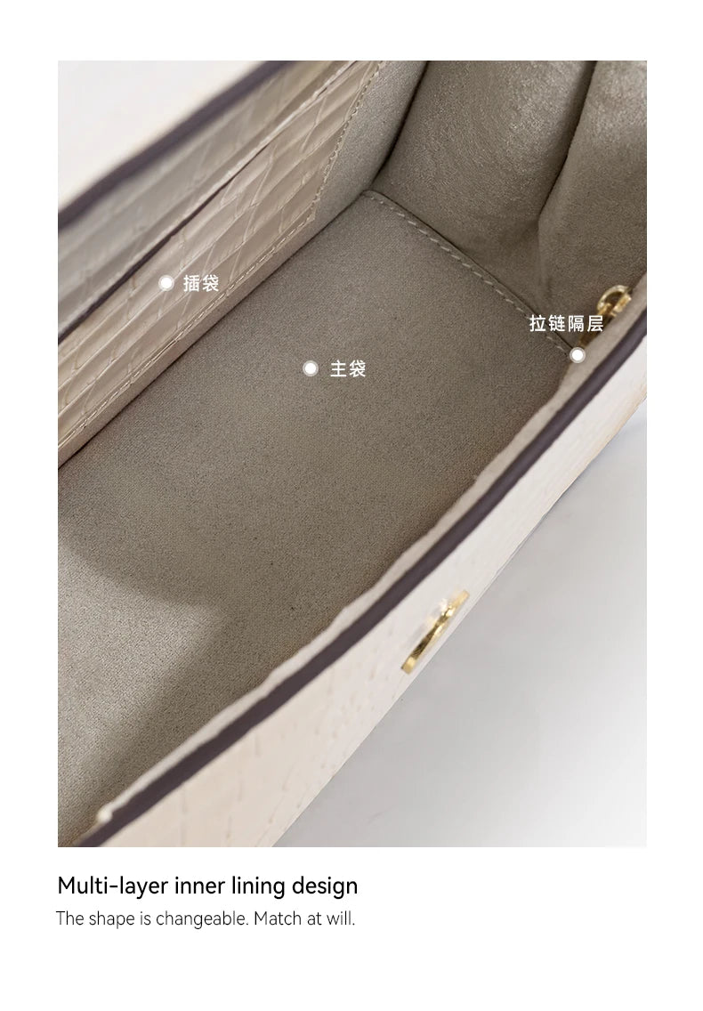 Le sac à main en cuir véritable BAFELLI au motif crocodile tendance est doté d’une bandoulière amovible en cuir de vache, adaptée au port à la main.