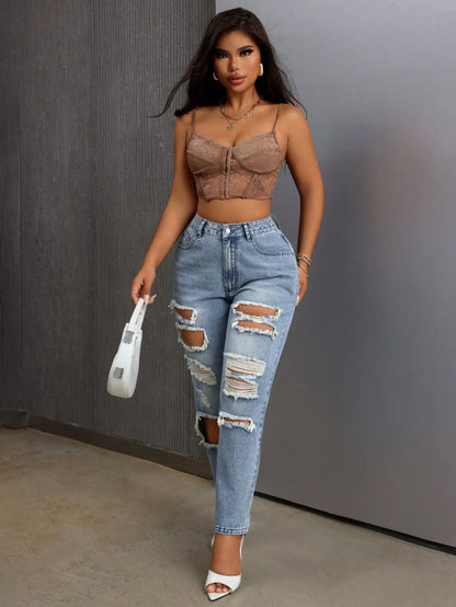 Mode européenne et américaine, jeans délavés et déchirés polyvalents et décontractés, nouveaux pantalons femme printemps-été à jambes étroites. Jeans 9 pouces
