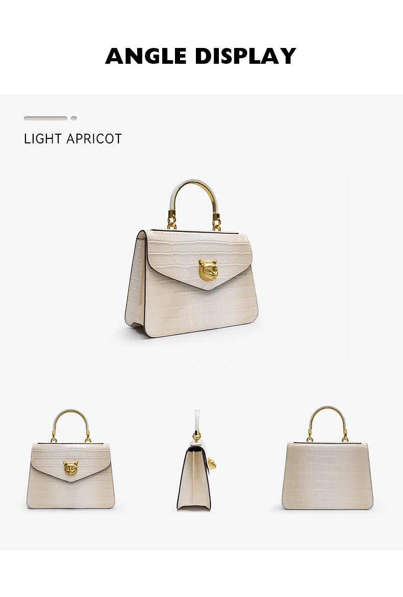 Le sac à main en cuir véritable BAFELLI au motif crocodile tendance est doté d’une bandoulière amovible en cuir de vache, adaptée au port à la main.